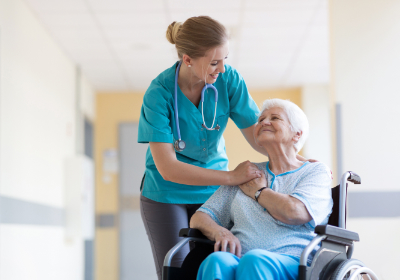 Nurse helping elderly patient